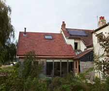 Solar water heating panels on farmhouse roof
